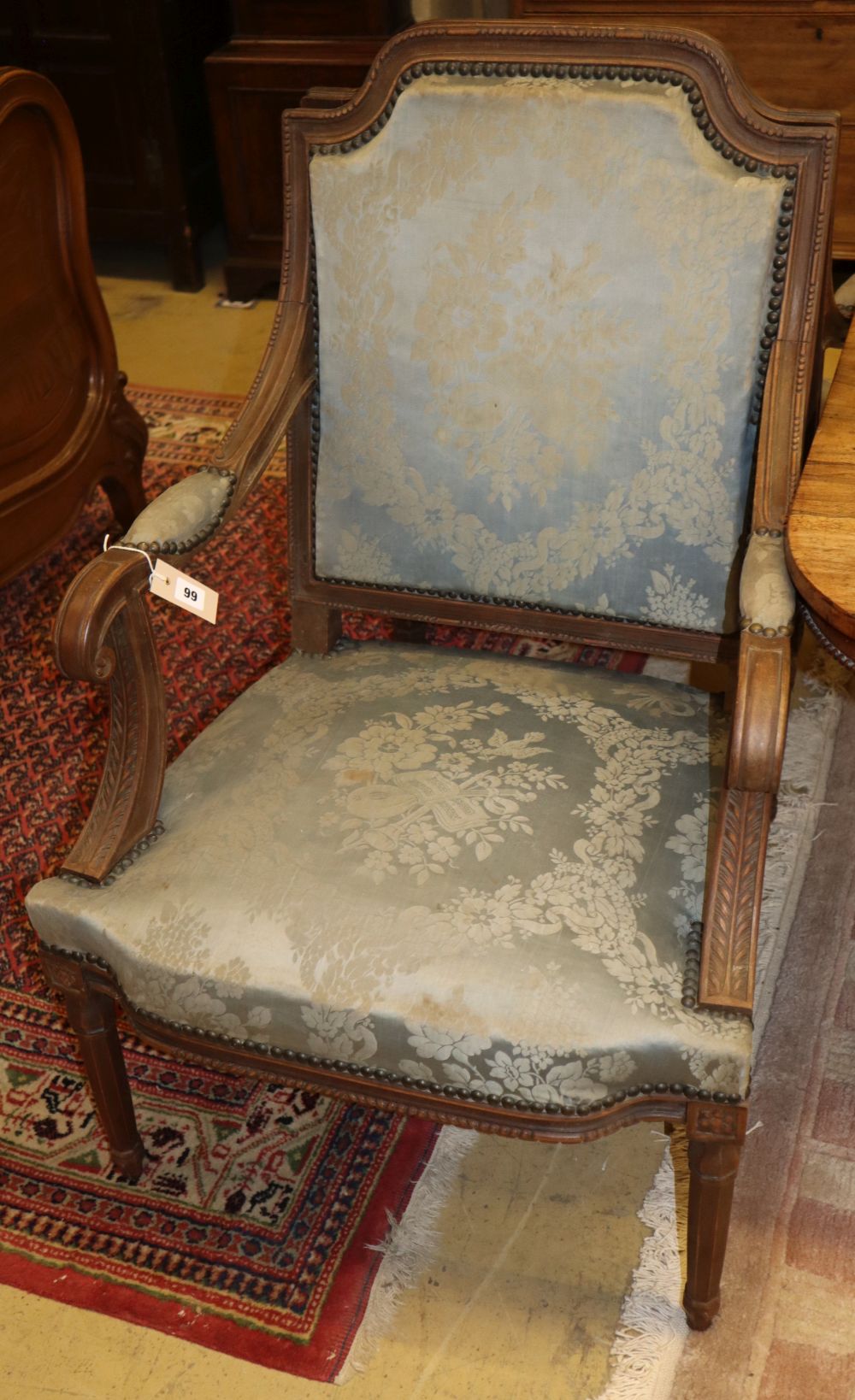 A pair of Louis XVI style open arm fauteuils, W.60cm, D.64cm, H.100cm